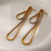 Aretes dorados colgantes - Dressygt