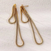 Aretes dorados colgantes - Dressygt