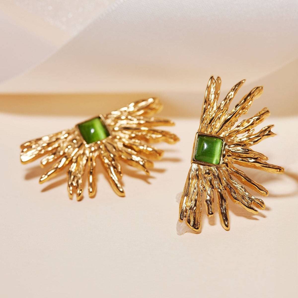 Aretes con diseño de sol - Dressygt