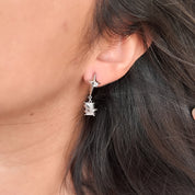 Aretes con estrella colgante - Dressygt