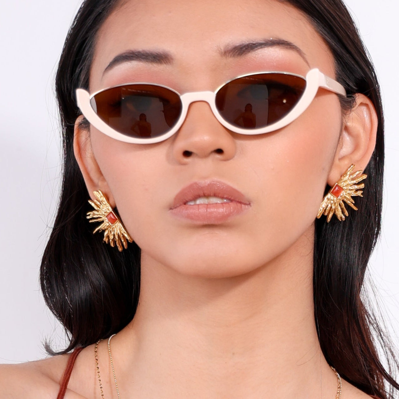 Aretes con diseño de sol - Dressygt