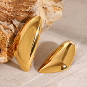 Aretes dorados con diseño irregular - Dressygt