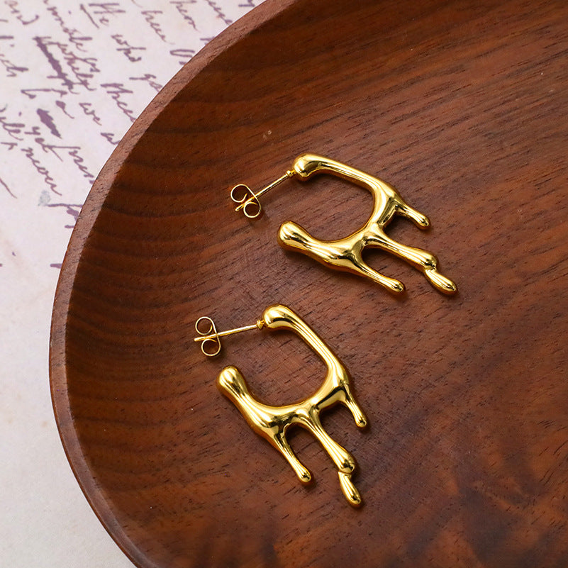 Aretes dorado con diseño irregular - Dressygt