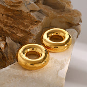 Aretes dorados con diseño de donas - Dressygt