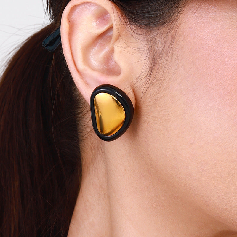 Aretes dorados con negro - Dressygt