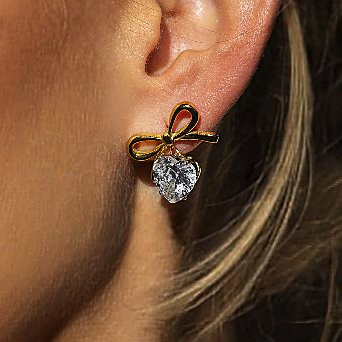 Aretes con diseño de moña - Dressygt