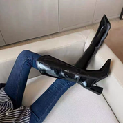 Botas altas negras de tacón