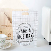 Medio ciento bolsa de empaque HAVE A NICE DAY de 22 X 15.5cm