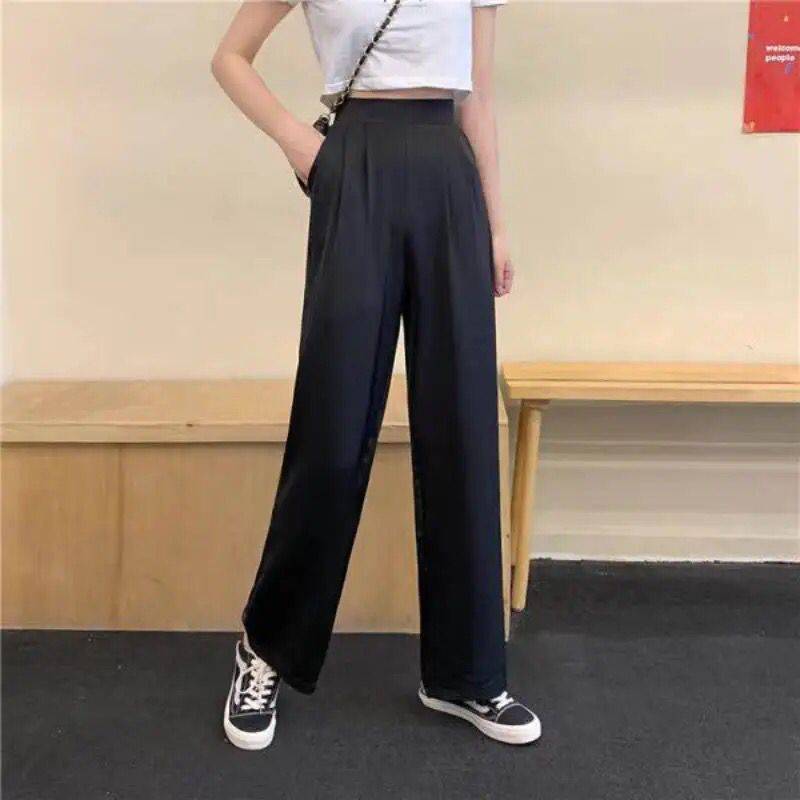 Pantalón flare de tela