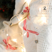 Set de luces de moños y cascabeles