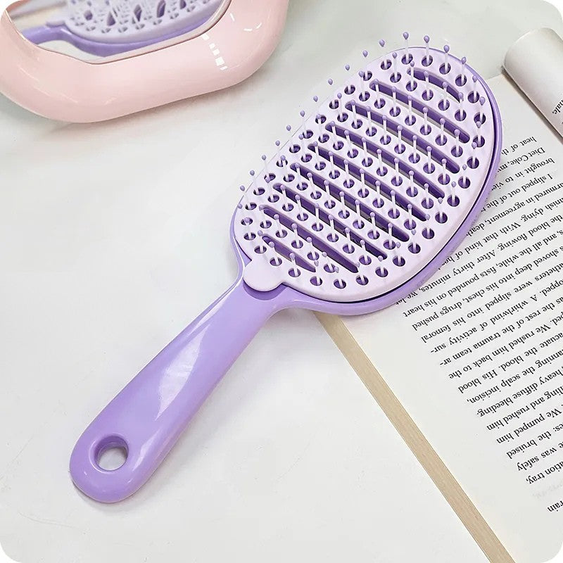 Cepillo desenredante con cubierta de limpieza fácil