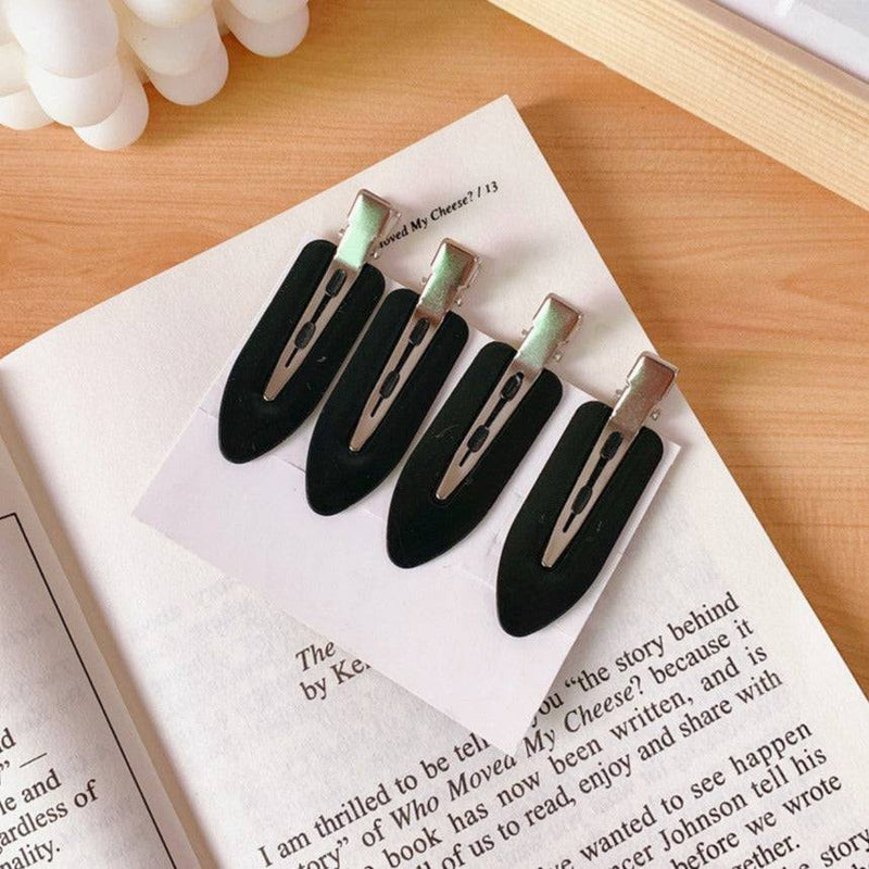Set de 4 pinzas para el cabello