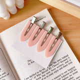 Set de 4 pinzas para el cabello