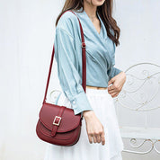 Bolso con correa larga