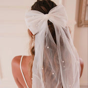 Moño estilo velo de novia