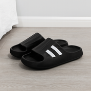 Sandalias tipo slide con líneas