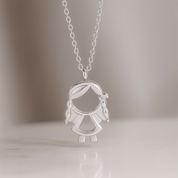 Collar con dije de niño plateado - Dressygt
