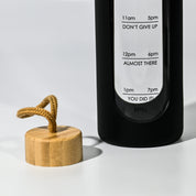 Botella de agua de vidrio