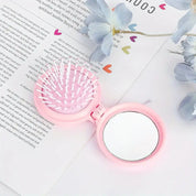 Mini cepillo plegable con espejo