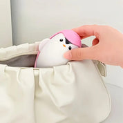 Removedor de pelusa reutilizable de pingüino