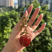 Docena de llaveros de manzana