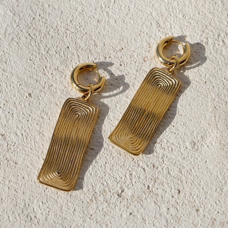 Aretes colgante dorados rectangular