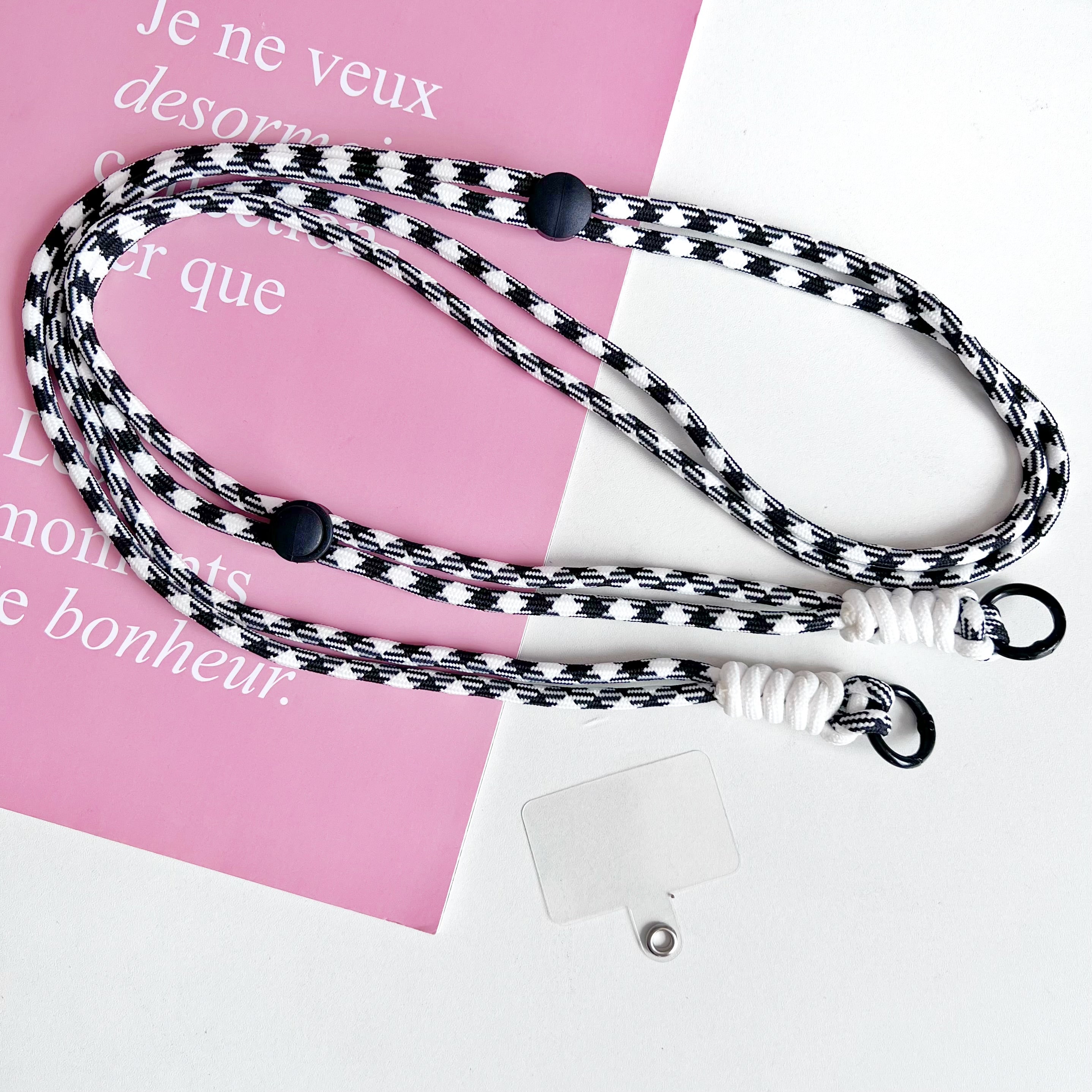 Strap blanco y negro para celular