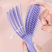 Mini cepillo desenredante flexible para cabello