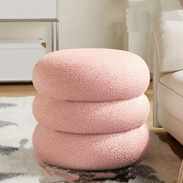 Taburete pequeño con asiento acolchonado