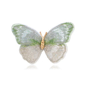 Broche de mariposa