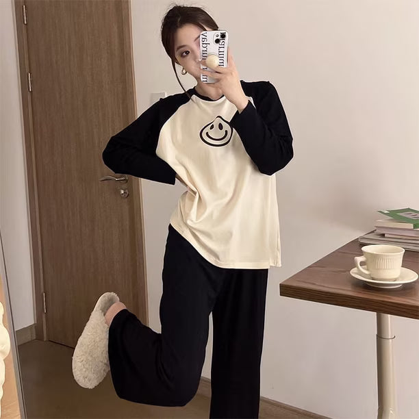 Pijama de 2 piezas de manga larga con carita feliz