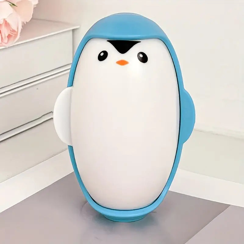 Removedor de pelusa reutilizable de pingüino
