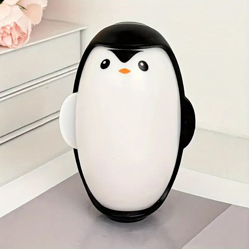 Removedor de pelusa reutilizable de pingüino