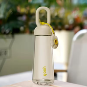 Botella para agua con charm de flor - Dressygt