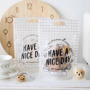 Medio ciento bolsa de empaque HAVE A NICE DAY de 22 X 15.5cm