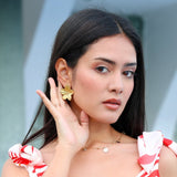 Aretes con diseño de flor