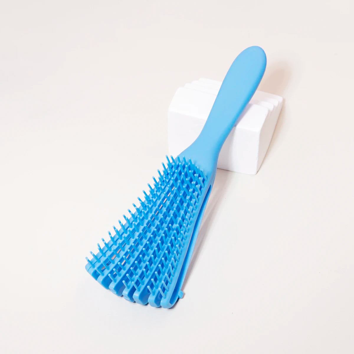 Cepillo flexible para cabello