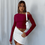 Blusa asimétrica de manga larga