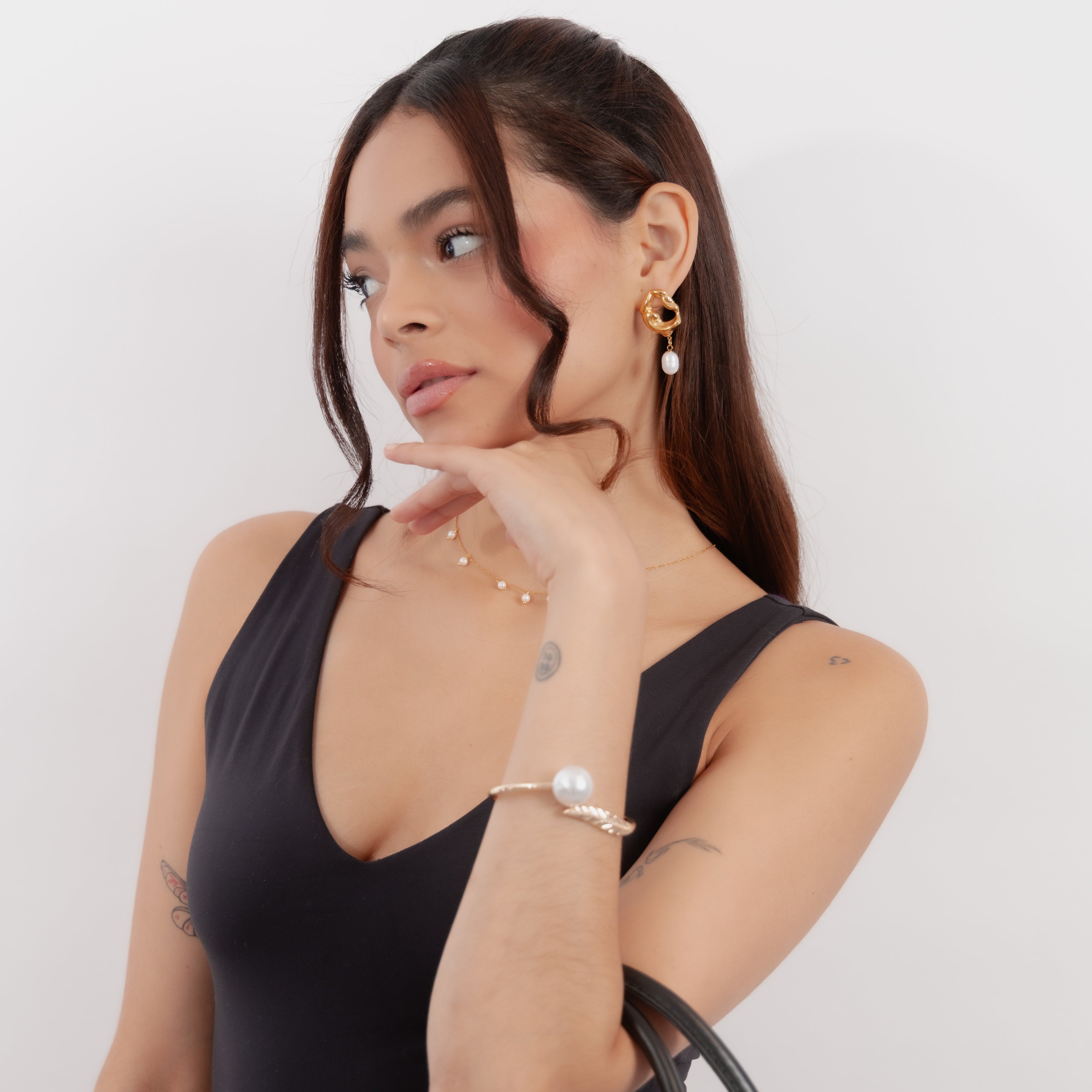 Pulsera de pluma y perla