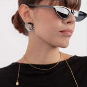 Aretes con diseño de margarita
