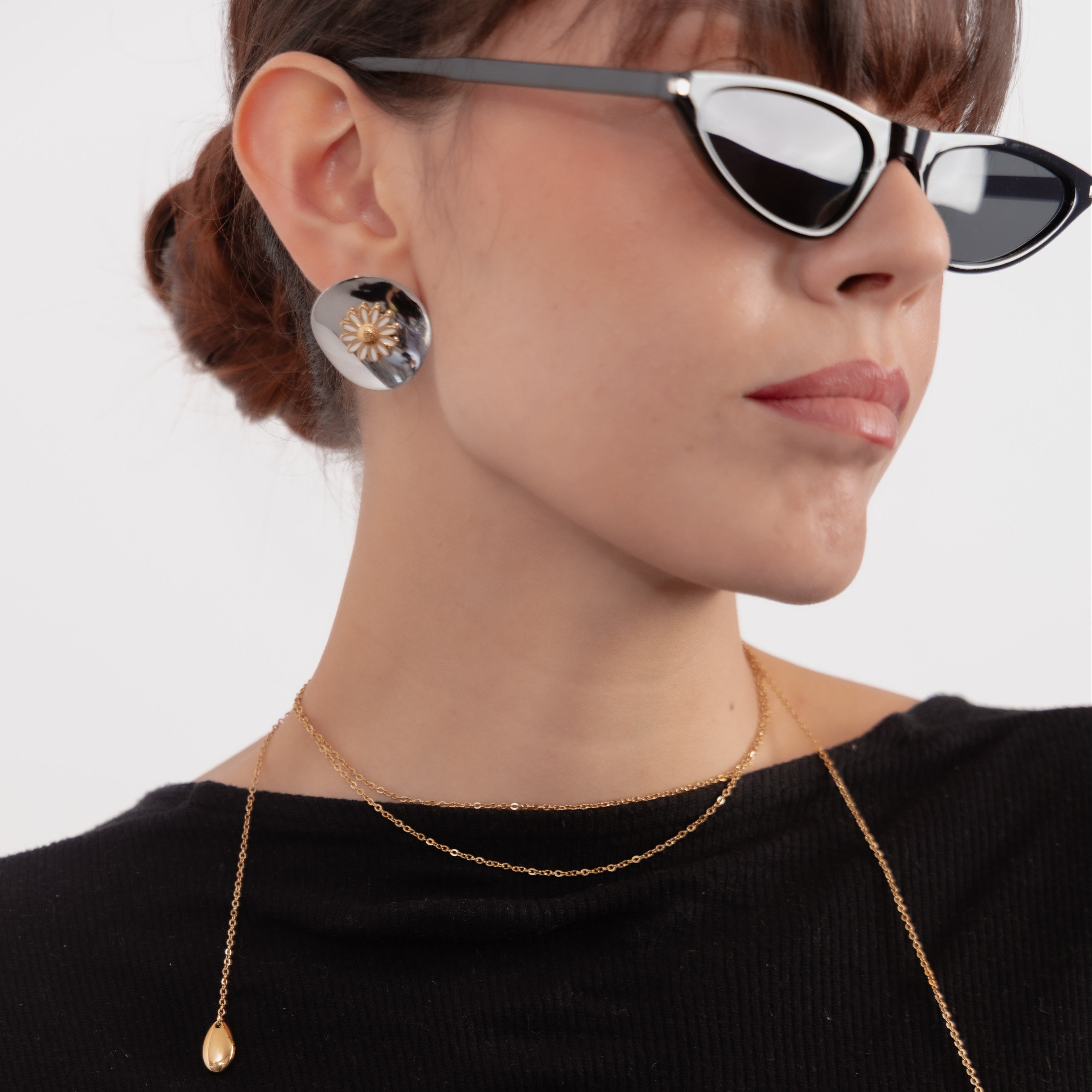 Aretes con diseño de margarita