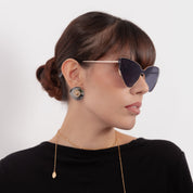 Aretes con diseño de margarita