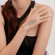 Pulsera con dije de esfera