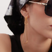 Aretes dorados colgantes