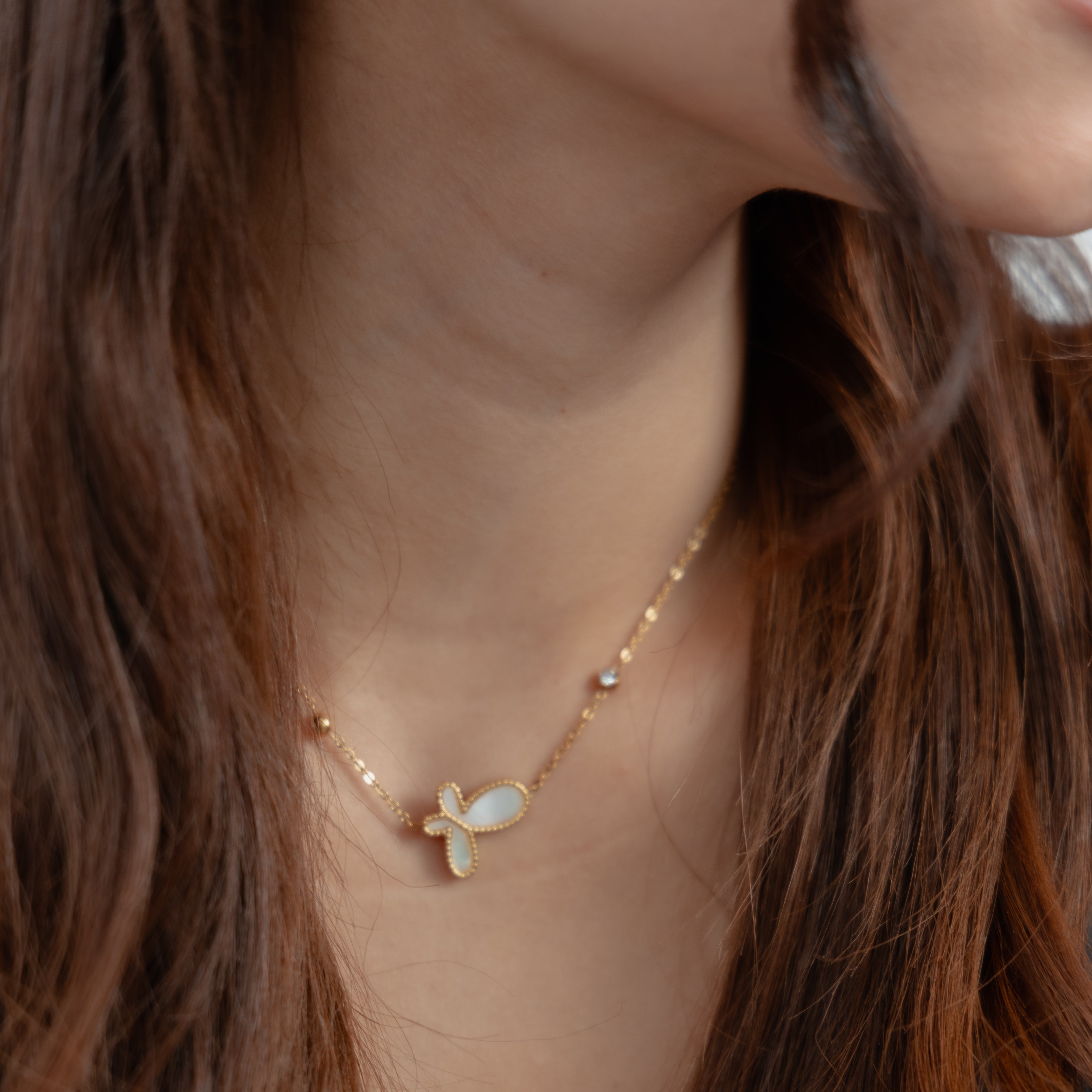 Collar con diseño de mariposa