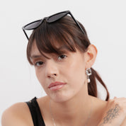 Aretes con diseño de perla colgante