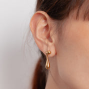 Aretes colgantes con diseño irregular