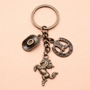 Llavero con dijes de vaqueros - Dressygt