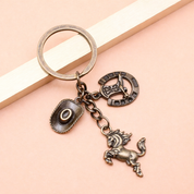 Llavero con dijes de vaqueros - Dressygt