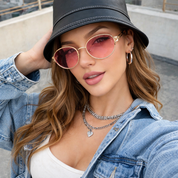 Lentes de sol ovalados con detalles dorados - Dressygt